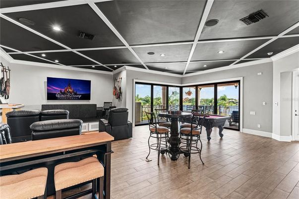 Billiard Table, Dining room, Game Room, Interior, Living room, Recessed Lighting, Wood Texture Flooring