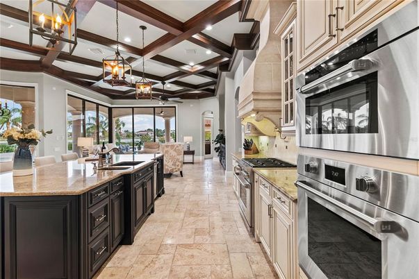 Chandelier, Interior, Kitchen, Living room, Pendant Lights, Recessed Lighting, Stainless Steel Appliances, Wooden Beams