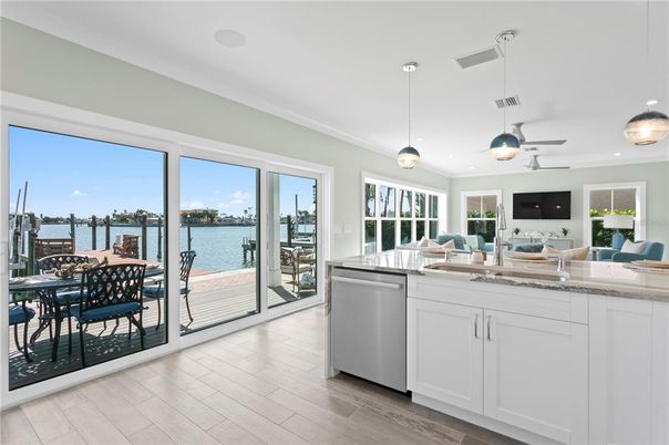 Dining room, Interior, Kitchen, Pendant Lights, Recessed Lighting, Water, Wood Texture Flooring