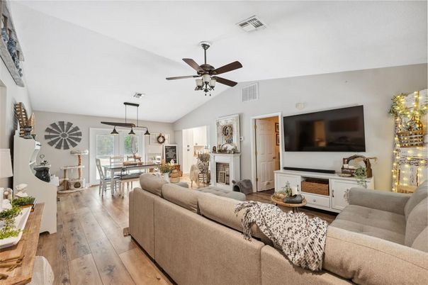 Dining room, Fireplace, Interior, Living room, Pendant Lights, Wood Texture Flooring