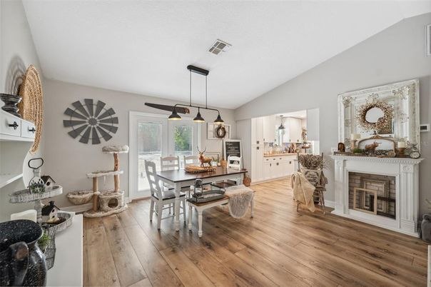 Dining room, Fireplace, Interior, Pendant Lights, Wood Texture Flooring