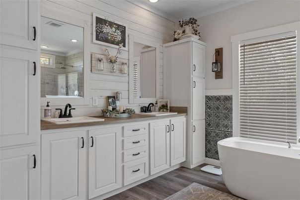 Bathroom, Dual Sink Vanities, Free Standing Baths, Interior, Recessed Lighting, Wood Texture Flooring