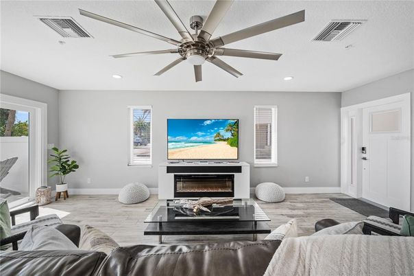 Fireplace, Interior, Living room, Recessed Lighting, Wood Texture Flooring