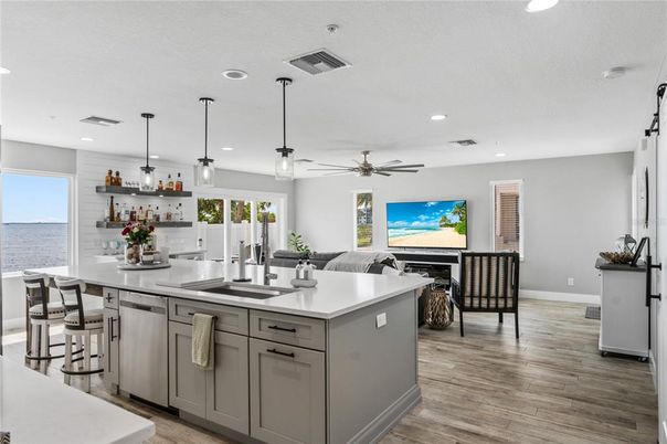Dining room, Interior, Kitchen, Living room, Pendant Lights, Recessed Lighting, Water, Wood Texture Flooring