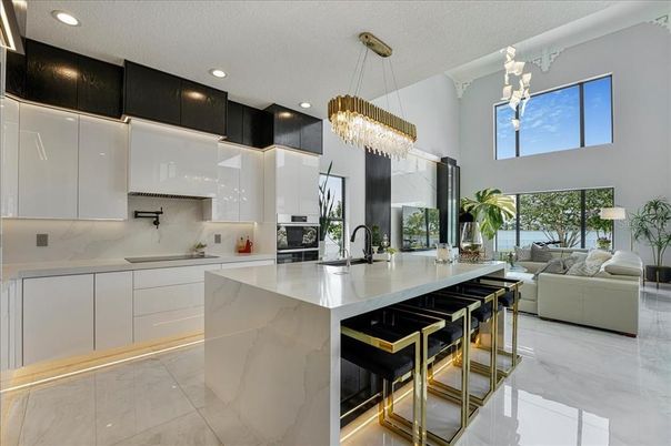 Chandelier, Interior, Kitchen, Living room, Marble, Pendant Lights, Recessed Lighting, Stainless Steel Appliances, Water