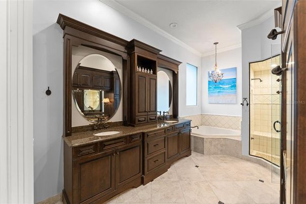Bathroom, Chandelier, Dual Sink Vanities, Glass Shower, Interior, Pendant Lights, Recessed Lighting