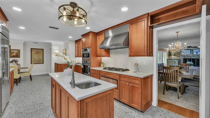 Chandelier, Dining room, Interior, Kitchen, Recessed Lighting, Stainless Steel Appliances, Wood Texture Flooring