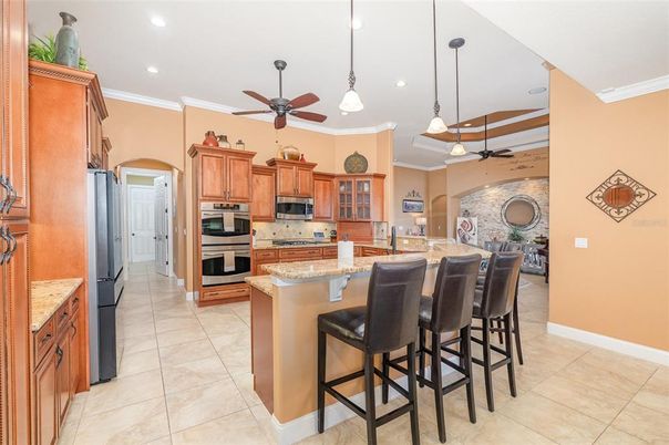 Interior, Kitchen, Pendant Lights, Recessed Lighting, Stainless Steel Appliances, Stone Walls