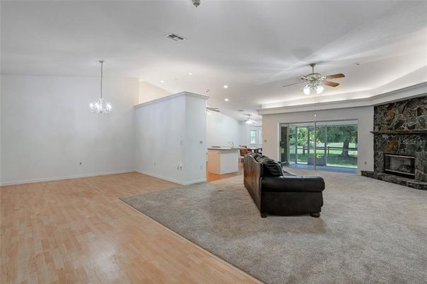 Fireplace, Interior, Pendant Lights, Recessed Lighting, Wood Texture Flooring