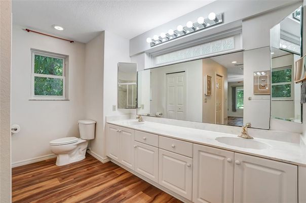 Bathroom, Dual Sink Vanities, Interior, Recessed Lighting, Wood Texture Flooring