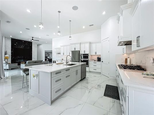 Interior, Kitchen, Living room, Marble, Marble Walls, Pendant Lights, Recessed Lighting, Stainless Steel Appliances