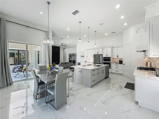 Dining room, Interior, Kitchen, Living room, Marble, Pendant Lights, Recessed Lighting, Stainless Steel Appliances