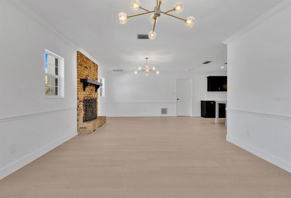 Empty room, Fireplace, Interior, Pendant Lights, Wood Texture Flooring