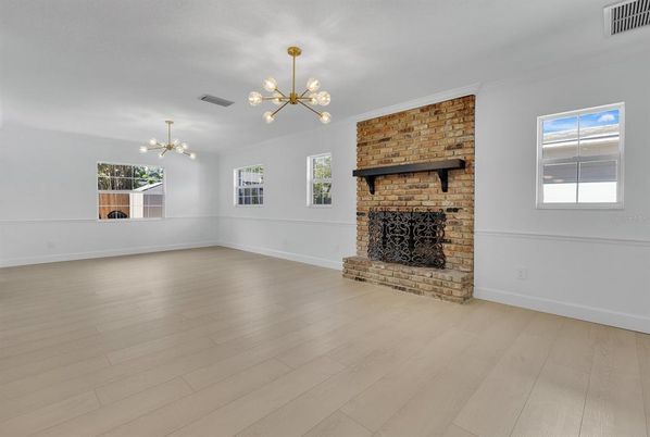 Empty room, Fireplace, Interior, Pendant Lights, Wood Texture Flooring
