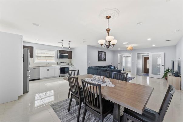 Chandelier, Dining room, Interior, Kitchen, Living room, Pendant Lights, Recessed Lighting, Stainless Steel Appliances
