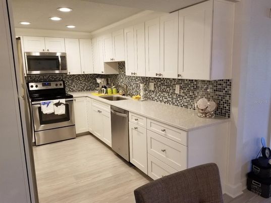 Interior, Kitchen, Recessed Lighting, Stainless Steel Appliances, Wood Texture Flooring