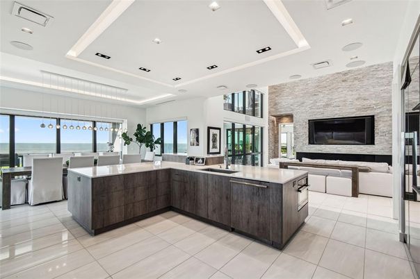 Dining room, Fireplace, Interior, Kitchen, Living room, Pendant Lights, Recessed Lighting, Stainless Steel Appliances, Stone Walls, Water