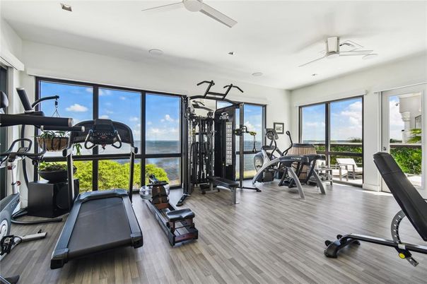 Fitness Equipment, Gym, Interior, Recessed Lighting, Water, Wood Texture Flooring