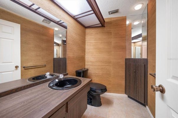 Bathroom, Dual Sink Vanities, Interior, Recessed Lighting, Wooden Walls