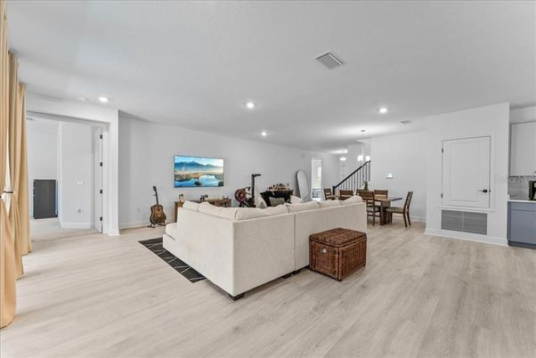 Dining room, Interior, Living room, Pendant Lights, Recessed Lighting, Wood Texture Flooring