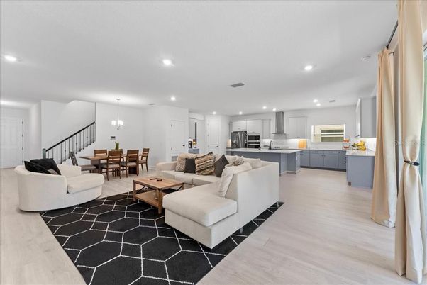 Dining room, Interior, Kitchen, Living room, Pendant Lights, Recessed Lighting, Stainless Steel Appliances, Wood Texture Flooring