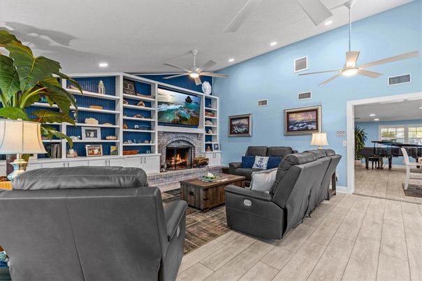 Dining room, Fireplace, Interior, Living room, Recessed Lighting, Wood Texture Flooring