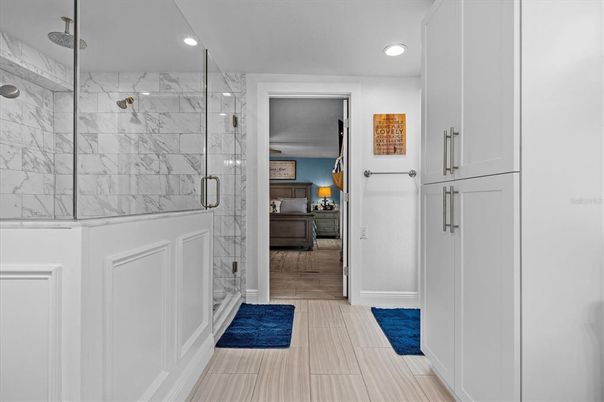Bathroom, Bedroom, Glass Shower, Interior, Marble Walls, Recessed Lighting, Wood Texture Flooring