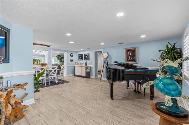Chandelier, Dining room, Interior, Piano, Recessed Lighting, Wood Texture Flooring