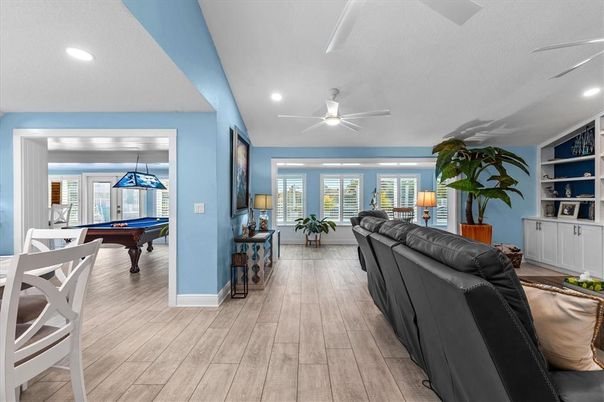 Billiard Table, Game Room, Interior, Living room, Pendant Lights, Recessed Lighting, Wood Texture Flooring