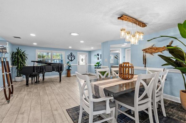Dining room, Interior, Pendant Lights, Piano, Recessed Lighting, Wood Texture Flooring
