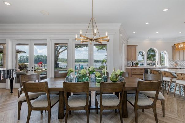 Chandelier, Dining room, Interior, Kitchen, Pendant Lights, Recessed Lighting, Water, Wood Texture Flooring