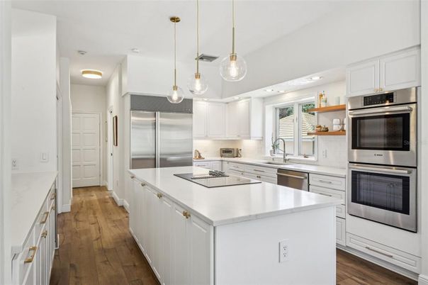 Interior, Kitchen, Pendant Lights, Recessed Lighting, Stainless Steel Appliances, Wood Texture Flooring