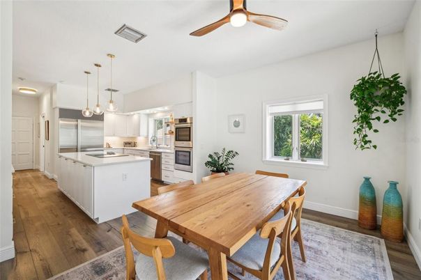 Dining room, Interior, Kitchen, Pendant Lights, Stainless Steel Appliances, Wood Texture Flooring