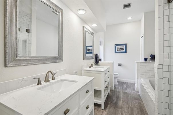 Bathroom, Dual Sink Vanities, Interior, Recessed Lighting, Wood Texture Flooring