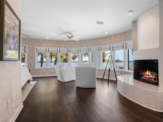 Fireplace, Interior, Living room, Recessed Lighting, Water, Wood Texture Flooring
