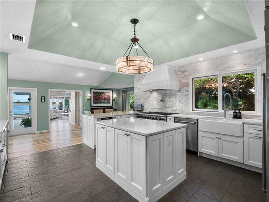 Chandelier, Interior, Kitchen, Pendant Lights, Recessed Lighting, Stainless Steel Appliances, Wood Texture Flooring