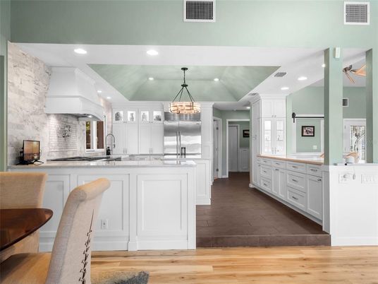 Chandelier, Interior, Kitchen, Pendant Lights, Recessed Lighting, Stainless Steel Appliances, Wood Texture Flooring