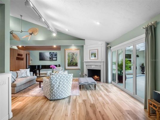 Fireplace, Interior, Living room, Pendant Lights, Piano, Recessed Lighting, Wood Texture Flooring