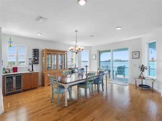 Chandelier, Dining room, Interior, Recessed Lighting, Water, Wood Texture Flooring
