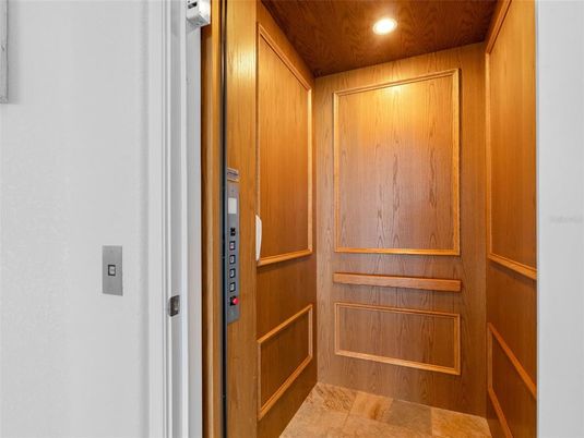 Elevator, Interior, Recessed Lighting, Wooden Ceilings, Wooden Walls