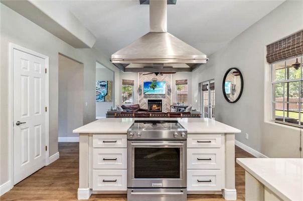 Fireplace, Interior, Kitchen, Stainless Steel Appliances, Wood Texture Flooring
