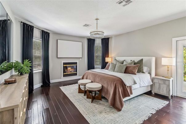 Bedroom, Chandelier, Fireplace, Interior, Pendant Lights, Wood Texture Flooring