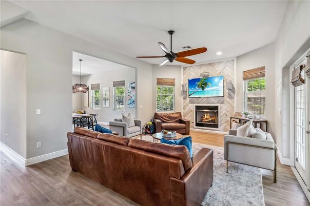 Dining room, Fireplace, Interior, Living room, Pendant Lights, Recessed Lighting, Wood Texture Flooring