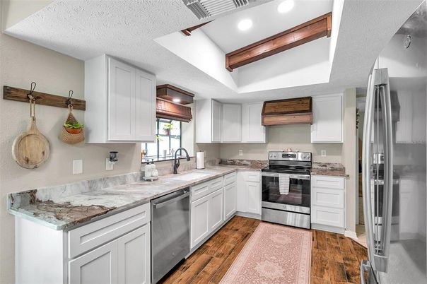 Interior, Kitchen, Recessed Lighting, Stainless Steel Appliances, Wood Texture Flooring