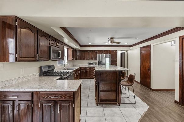 Interior, Kitchen, Recessed Lighting, Stainless Steel Appliances, Wood Texture Flooring