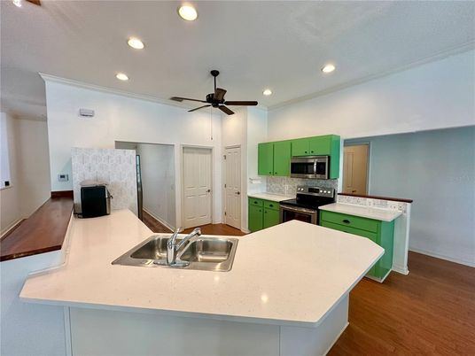 Interior, Kitchen, Recessed Lighting, Stainless Steel Appliances, Wood Texture Flooring