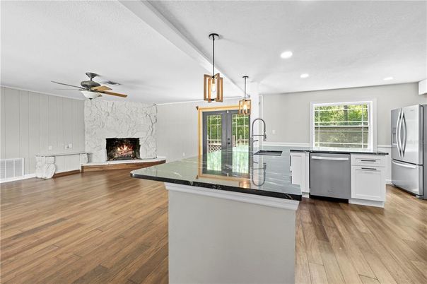 Fireplace, Interior, Kitchen, Pendant Lights, Recessed Lighting, Wood Texture Flooring