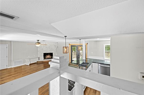 Fireplace, Interior, Pendant Lights, Recessed Lighting, Wood Texture Flooring