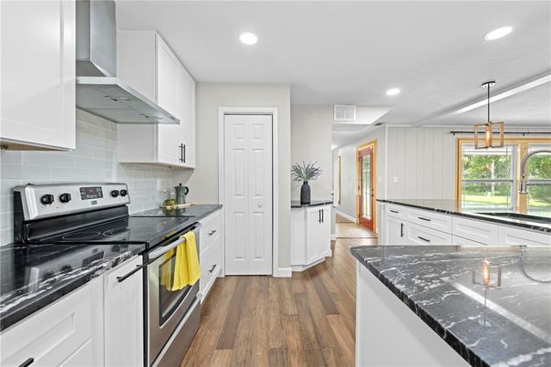 Interior, Kitchen, Pendant Lights, Recessed Lighting, Stainless Steel Appliances, Wood Texture Flooring
