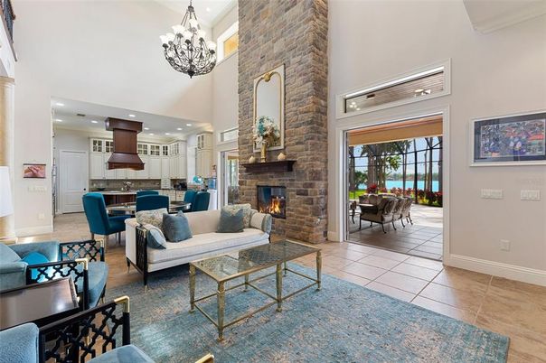 Chandelier, Dining room, Fireplace, Interior, Kitchen, Living room, Pendant Lights, Recessed Lighting, Stone Walls